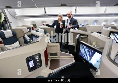 Vancouver, Canada. 28th Mar, 2017. People visit the cabin of an Airbus A350-900 passenger jet after its first scheduled flight to Canada in Vancouver, Canada, on March 28, 2017. A new Airbus A350-900 passenger jet made its first scheduled flight to Canada on Tuesday and began Cathay Pacific's use of the plane for its Vancouver-Hong Kong route. Credit: Liang Sen/Xinhua/Alamy Live News Stock Photo