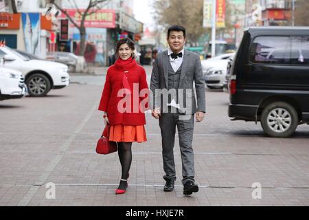 Heihe, Heihe, China. 25th Mar, 2017. Heihe, CHINA-March 25 2017: (EDITORIAL USE ONLY. CHINA OUT).The 28-year-old Chinese man Chen Jingyang gets married with the 22-year-old Russian woman in Heihe, northeast China's Heilongjiang Province, March 25th, 2017. The Russian girl went to China for further education five years ago and gradully became familiar with Chinese culture. The couple fell in love with each other at first sight and believed that they can embrace happy future. Credit: SIPA Asia/ZUMA Wire/Alamy Live News Stock Photo