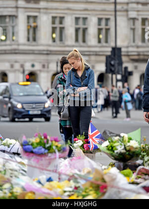 London, UK. 29th Mar, 2017. People start to gather in Westminster today a week after Khalid Masood killed four people on the bridge and at the Houses of Parliament Credit: Simon Dack/Alamy Live News Stock Photo