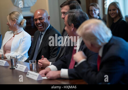 Washington DC, USA. 29th March 2017. Former New York Yankee great Mariano Rivera (2-L) laughs with US President Donald J. Trump (R), about baseball during an opioid and drug abuse listening session in the Roosevelt Room of the White House in Washington, DC, USA, 29 March 2017. Credit: Shawn Thew/Pool via CNP /MediaPunch/Alamy Live News Stock Photo
