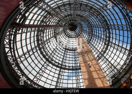 MELBOURNE, AUSTRALIA - OCTOBER 31, 2016: Underneath a hugh glass dome, Coop's Factory Shot Tower, built in 1888, is located in Melbourne Central shopp Stock Photo