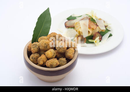ascolane olives with pasta in background Stock Photo