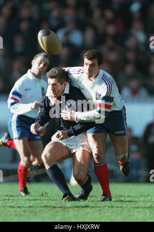 SADOURNY TAKES OUT HASTINGS FRANCE V SCOTLAND FIVE NATIONS 18 February 1995 Stock Photo