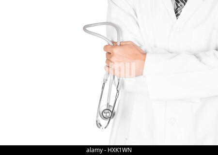 Closeup doctor holding stethoscope and hands crossed infront of him isolated on white background with clipping path Stock Photo