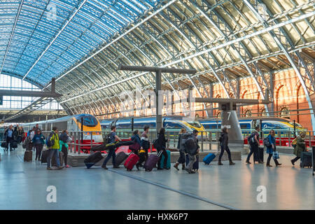 Passengers at St Pancras International railway station, London England United Kingdom UK Stock Photo