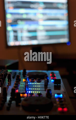 Mixing music in home audio studio Stock Photo