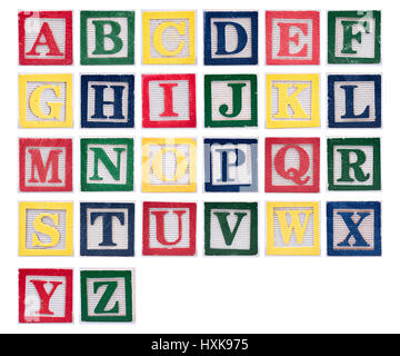 Alphabet isolated on white in old wooden colored blocks Stock Photo