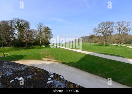 The of the parkland from the entrance of Lulworth castle on a spring afternoon in March. Stock Photo