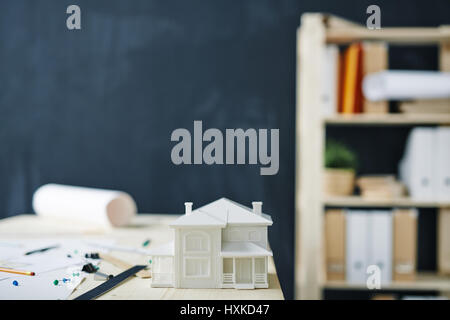 House Model on Desk in Office Stock Photo