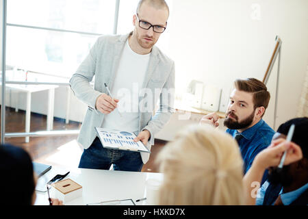 Sharing ideas with colleagues Stock Photo