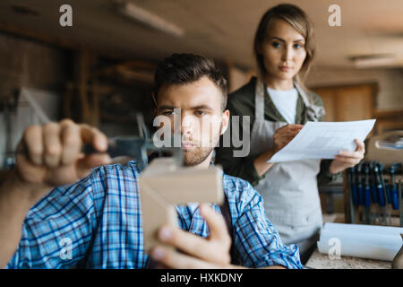 Measuring width with vernier caliper Stock Photo