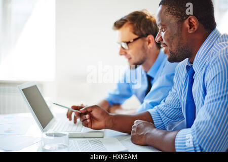 Business team focused on work Stock Photo