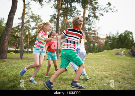 Children playing outdoors Stock Photo