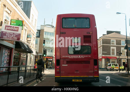 LONDON, UNITED KINGDOM - OCTOBER 10, 2012: Double decker bus on Wandsworth Rd in South London