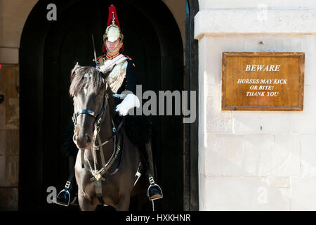 LONDON, UNITED KINGDOM - OCTOBER 10, 2012: Horse guard on duty in proximity to the Horse Guards Parade Square Stock Photo
