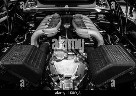 Engine compartment of a sports car Ferrari 512 TR, 1994. Black and white. Europe's greatest classic car exhibition 'RETRO CLASSICS' Stock Photo