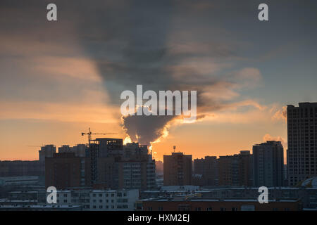 Coal-fired power plants cause air pollution in Ulaanbaatar, Mongolia. Stock Photo