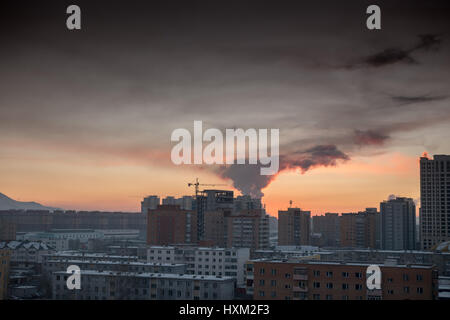 Coal-fired power plants cause air pollution in Ulaanbaatar, Mongolia. Stock Photo