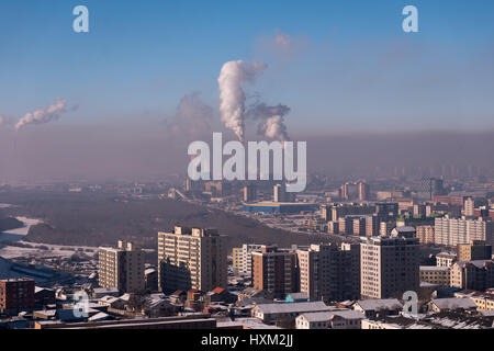 Coal-fired power plants cause extreme air pollution in Ulaanbaatar, Mongolia. Stock Photo