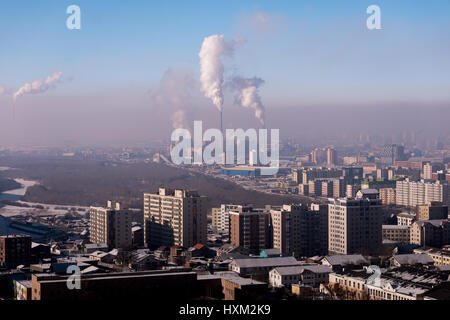 Coal-fired power plants cause extreme air pollution in Ulaanbaatar, Mongolia. Stock Photo