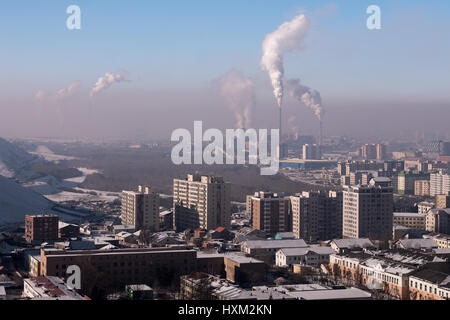 Coal-fired power plants cause extreme air pollution in Ulaanbaatar, Mongolia. Stock Photo