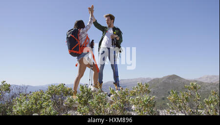 Happy couple giving high five Stock Photo