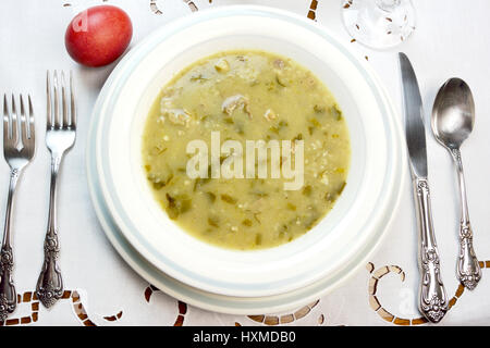 Easter lamb soup and a red egg Stock Photo