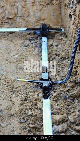 Galvanized Lightning Conductor Strip Put in a House Foundation. Stock Photo