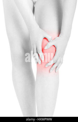 Woman fatigued legs with hands touching knee, red area isolated on white, clipping path Stock Photo