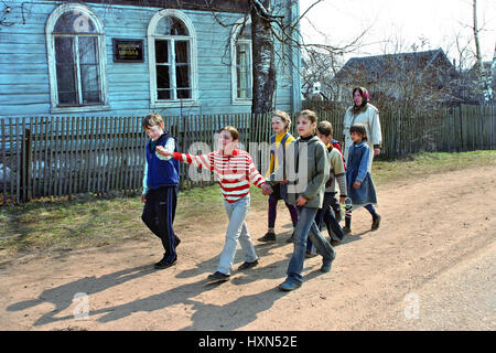 Tver, Russia - May 2, 2006: Elementary school in the Russian countryside, junior schoolchildren walk outdoors. An ungraded elementary rural school, fo Stock Photo