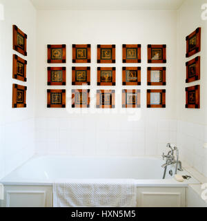 Bathroom with Greco-Roman pictures. Stock Photo