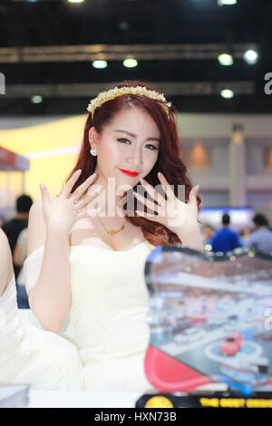 BANGKOK, THAILAND - MARCH 30, 2014: Unidentified female presenter pose in the 35th Bangkok International Motor Show on March 30, 2014 in Bangkok, Thai Stock Photo