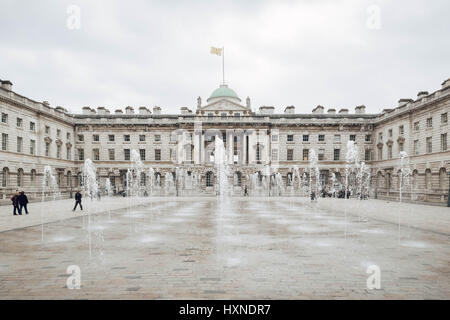 Colour photograph of Somerset House, the Strand, London showing the quad and the fountains in operation. Stock Photo