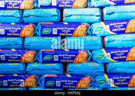 A stack of John Innes Multi-Purpose Compost bags for sale in a garden centre. Stock Photo