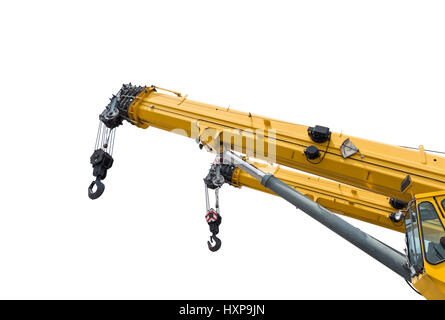 Yellow crane boom with hooks isolated on a white background with clipping paths Stock Photo