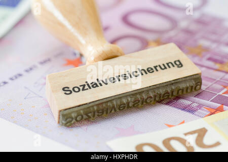 Stamp with label Social security, Stempel mit Aufschrift Sozialversicherung Stock Photo