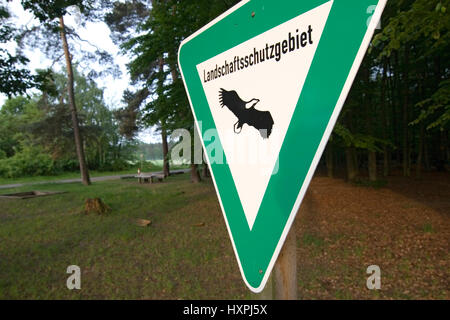 Sign Landscape protection area before a mixed forest in Rodgau, Hessians, Germany (no Pr), Schild Landschaftsschutzgebiet vor einem Mischwald in Rodga Stock Photo