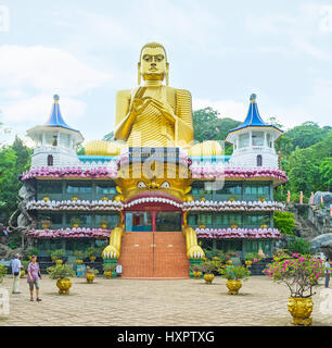 DAMBULLA, SRI LANKA - NOVEMBER 27, 2016: The Golden Temple and the Complex of Cave Temples are one the most popular landmarks of the country, visited  Stock Photo