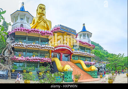 DAMBULLA, SRI LANKA - NOVEMBER 27, 2016: The splendid Golden Temple located at the foot of the rock, famous for the Cave Complex, important pilgrim an Stock Photo