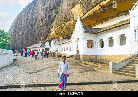 DAMBULLA, SRI LANKA - NOVEMBER 27, 2016: The Cave Complex of Dambulla Viharaya is one of the most venerated sites among the Buddhist worshipers, on No Stock Photo