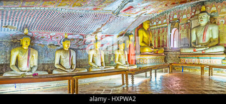 DAMBULLA, SRI LANKA - NOVEMBER 27, 2016: Panorama  of Maharaja Lena Cave (Great Kings) of Dambulla Monastery, decorated with ancient Buddhist patterns Stock Photo