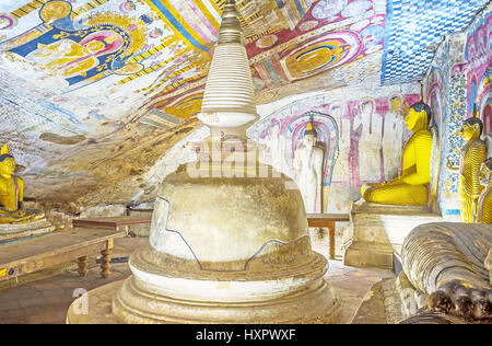 DAMBULLA, SRI LANKA - NOVEMBER 27, 2016: The preserved Paccima Viharaya (Western Temple) of Dambulla Cave Monastery with numerous statues of Buddha, S Stock Photo