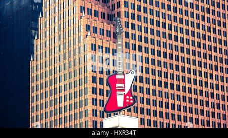 Large Guitar Sign on top of the Hard Rock Cafe in downtown Houston, Texas Stock Photo