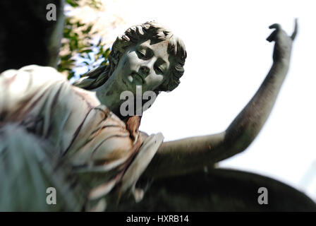 Angel's statue on the Ohlsdorfer cemetery in village Ohls, Hamburg, Germany, Europe, Engelsstatue auf dem Ohlsdorfer Friedhof in Ohlsdorf, Deutschland Stock Photo