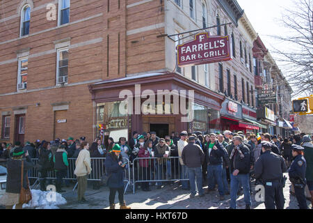 Farrell's Irish Pub is  always overflowing with celebration after the Irish American annual parade in honor of Saint Patrick's Day in the Park Slope neighborhood of Brooklyn, NY. Stock Photo