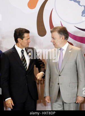 San Jose, Costa Rica. 29th Mar, 2017. Mexico's President Enrique Pena Nieto (L) talks with his Colombian counterpart Juan Manuel Santos at the 16th Tuxtla Summit of Central American and Latin American leaders, in San Jose, Costa Rica, March 29, 2017. Credit: Kent Gilbert/Xinhua/Alamy Live News Stock Photo