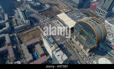 Shenyan, Shenyan, China. 30th Mar, 2017. The Fang Yuan Mansion, regarded as one of the top ten ugliest buildings by CNN and The Guardian, is located in Shenyang, northeast China's Liaoning Province. The 25-story building is shaped like an ancient Chinese coin. Credit: SIPA Asia/ZUMA Wire/Alamy Live News Stock Photo