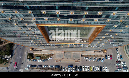 Shenyan, Shenyan, China. 30th Mar, 2017. The Fang Yuan Mansion, regarded as one of the top ten ugliest buildings by CNN and The Guardian, is located in Shenyang, northeast China's Liaoning Province. The 25-story building is shaped like an ancient Chinese coin. Credit: SIPA Asia/ZUMA Wire/Alamy Live News Stock Photo