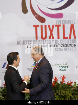 San Jose, Costa Rica. 29th Mar, 2017. Mexico's President Enrique Pena Nieto (L) talks with his Costa Rican counterpart Luis Guillermo Solis at the 16th Tuxtla Summit of Central American and Latin American leaders, in San Jose, Costa Rica, March 29, 2017. Credit: Kent Gilbert/Xinhua/Alamy Live News Stock Photo