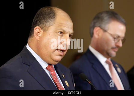 San Jose, Costa Rica. 29th Mar, 2017. Costa Rican President Luis Guillermo Solis (L) addresses a press conference after the 16th Tuxtla Summit of Central American and Latin American leaders, in San Jose, Costa Rica, March 29, 2017. Credit: Kent Gilbert/Xinhua/Alamy Live News Stock Photo